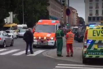 A video grab taken from Twitter on August 18, 2017 shows officials standing in a street in the Finnish city of Turku where several people were stabbed. "Police shot the suspected perpetrator in the legs," police wrote on Twitter. "The person has been arrested. We recommend that people avoid central Turku / AFP PHOTO / Juha Riihimaki (Photo credit should read JUHA RIIHIMAKI/AFP/Getty Images)